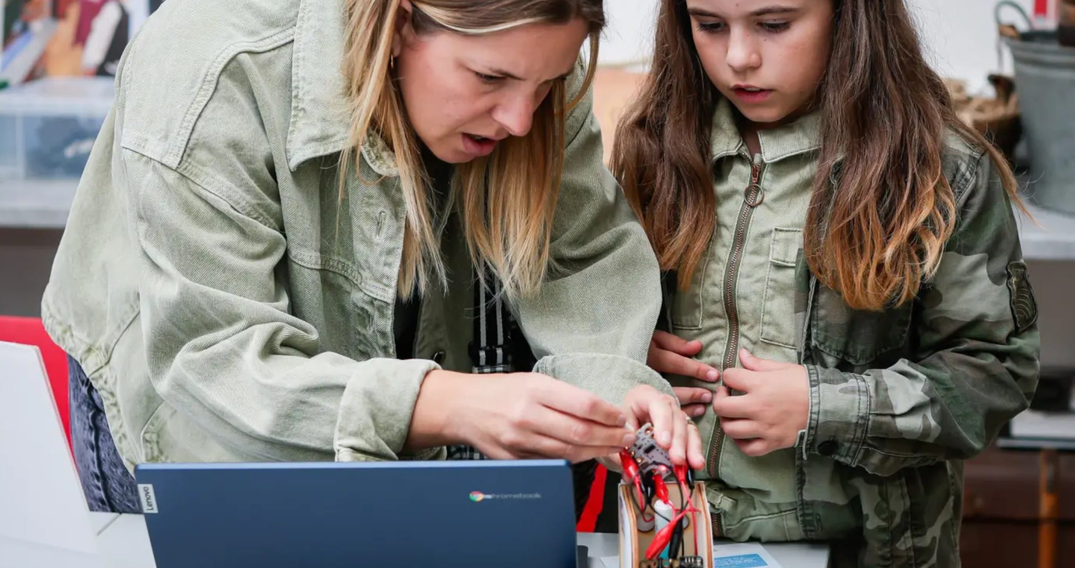 mother and aughter working on an interactive activity together at Portsmouth Historic Dockyard